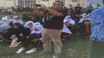 Bupati Romi Tertekan MTQ 2007