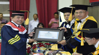 Bupati Merangin, H Al Haris Kini Bergelar Doktor