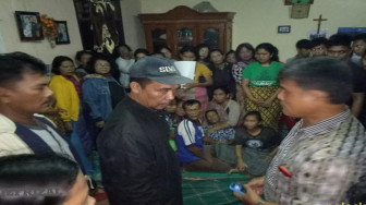 Duman Ditemukan Tewas Terhimpit Sepeda Motor