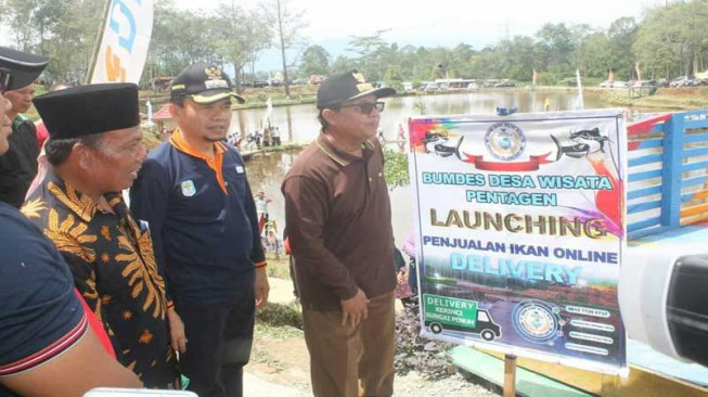 Bupati Kerinci Dampingi Plt Gubernur Panen Ikan dan Launching Penjualan Ikan Online
