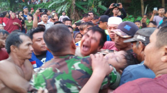 Serda Akil Lukman Bantu  Evakuasi Korban Hanyut di Sungai
