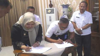 Bupati Muarojambi dan Kakanwil Kemenkumham Teken MoU