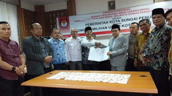 KPU Dan Pemkot Sungai Penuh Tanda Tangani NPHD Pilwako