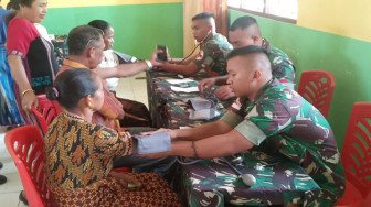 Bakti Sosial Satgas Yonif Raider 142/KJ, Perkokoh Kemanunggalan TNI - Rakyat