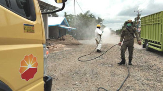 Cegah Penyebaran Covid-19, SKKMigas - PetroChina Beri Bantuan dan Lakukan Disinfeksi di Tanjabbar