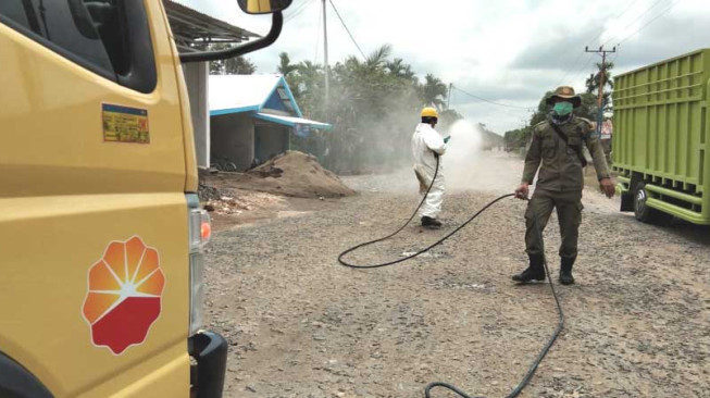 Cegah Penyebaran Covid-19, SKKMigas - PetroChina Beri Bantuan dan Lakukan Disinfeksi di Tanjabbar