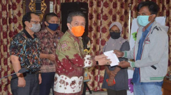 Bupati Syahirsah Ajak Warga Selalu Gunakan Masker 