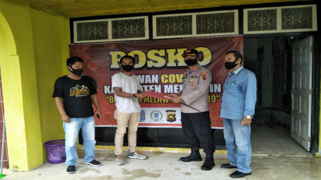Kapolres Merangin Salurkan Donasi Lewat Relawan Covid-19