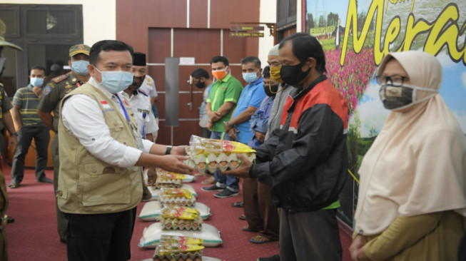 Ojek dan Pelaku UMKM dapat Bansos Dampak Covid-19 Dari Pemkab Merangin