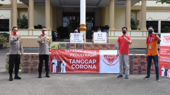 Yayasan Wing Peduli Kasih Beri Bantuan Penanggulangan Corona Melalui Polda Jambi