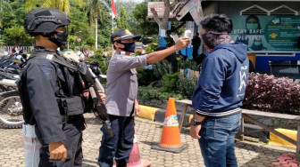 Satbrimob Polda Jambi Lakukan Sosialisasi Protokol Kesehatan Selama Pandemi Wabah Covid 19