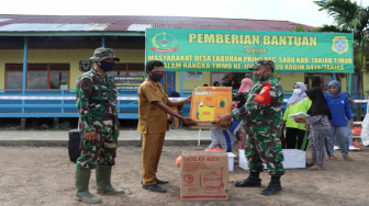 Satgas TMMD Kodim Tanjab Beri Bantuan Alat Semprot Disinfektan