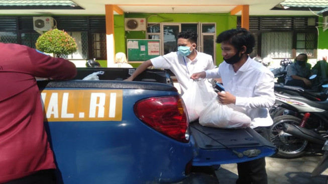 Mengabdi di Tengah Pandemi Covid-19, Mahasiswa Kukerta Universitas Riau Jadi Relawan