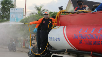 Bersama Forkopimda, Bupati Lakukan Penyemprotan Disinfektan di Kuala Tungkal