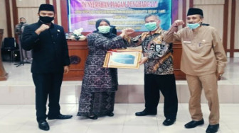 Bupati Masnah Terima Piagam Penghargaan Predikat WTP 4 Kali Berturut-turut