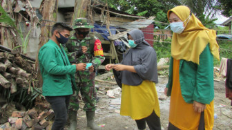 Satgas TMMD 110 Kodim Batanghari Sosialisasi dan Bagi-Bagi Masker