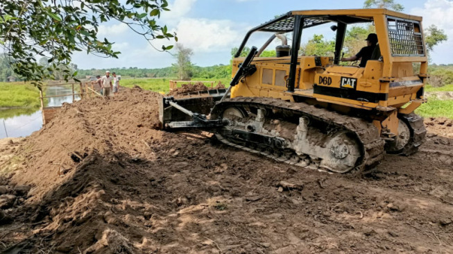 Satgas TMMD Kodim Batanghari Mulai Ratakan Pembangunan Jalan