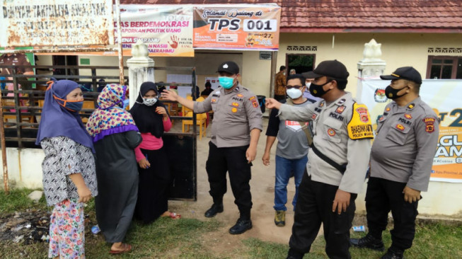 Polisi Kawal Ketat TPS 01 Napal Sisik di PSU Gubernur Jambi