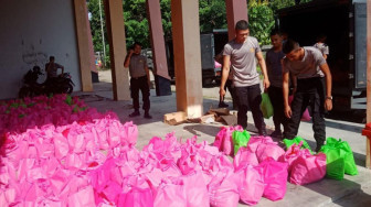 Memotivasi Percepatan Vaksin, Polda Jambi Bantu 400 Paket Sembako