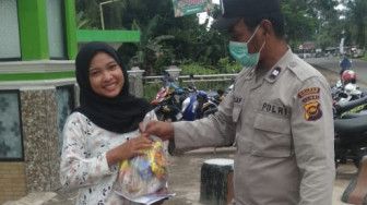 Polsek Muara Bulian Suntik Warga dengan Sembako