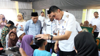 Pj Bupati Muaro Jambi Salurkan Bantuan Untuk 184 Anak Yatim se Kecamatan Jambi Luar Kota.