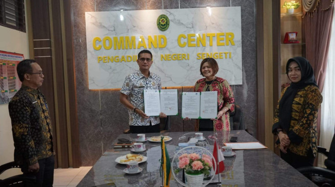 Tingkatkan Layanan Informasi Diskominfo Kabupaten Muaro Jambi Jalin Kerja Sama dengan Pengadilan Negeri Sengeti