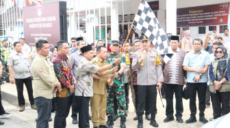 Kapolda Jambi Ikuti Pelaksanaan Pelepasan Distribusi Logistik Kotak Suara di Kantor KPU Kabupaten Bungo.