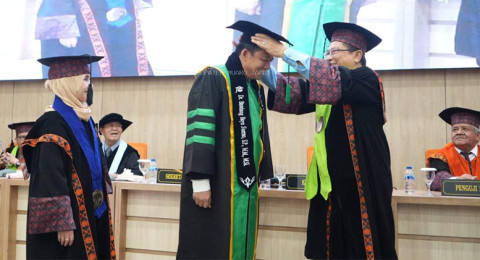 Bupati Muaro Jambi Resmi Sandang Gelar Doktor, Angkat Tema Kesejahteraan Petani Sawit