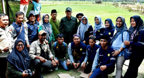 Bupati Batang Hari Hadiri Sedekah Bubur di Desa Pasar Terusan