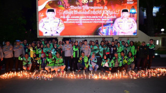 Nyalakan 1000 Lilin,Polda Jambi Gelar Aksi Damai