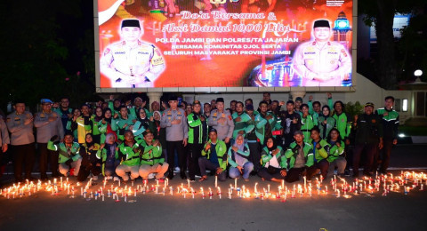 Nyalakan 1000 Lilin,Polda Jambi Gelar Aksi Damai