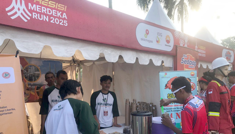 Booth UMKM Kopi Liberika Paristo binaan CSR SKK Migas-PetroChina International Jabung pada kegiatan Presisi Merdeka Run 2025 | dod