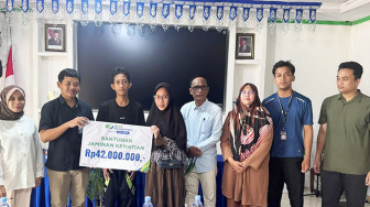 BPJS Ketenagakerjaan Batang Hari Serahkan Santunan JKM dan Gelar Employee Volunteering di Desa Muara Singoan